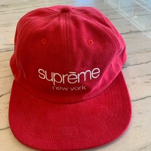 Red Supreme Corduroy Six-Panel Hat. Leather Adjustable Back.